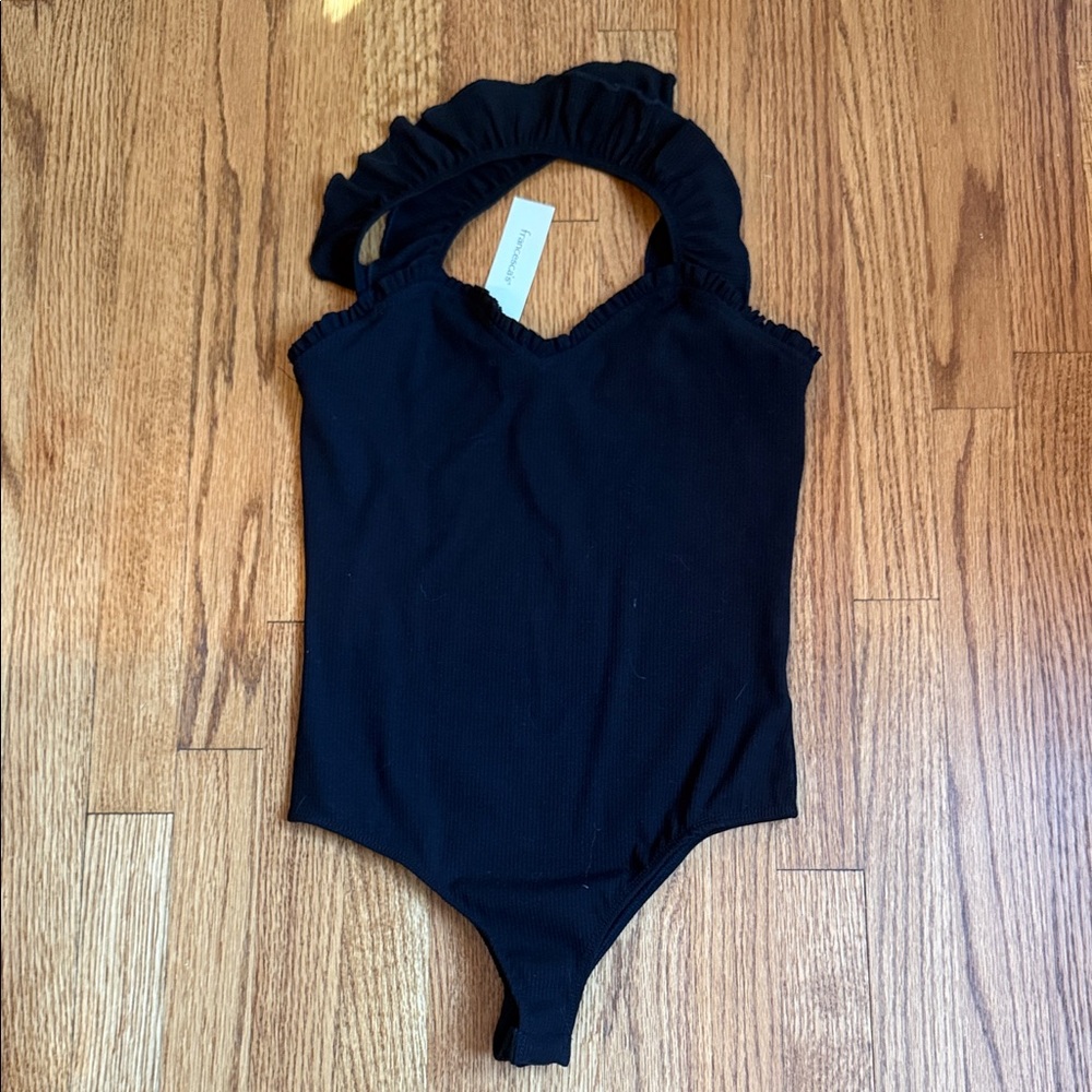 Francesca’s ruffled, sweetheart, neckline thong bodysuit